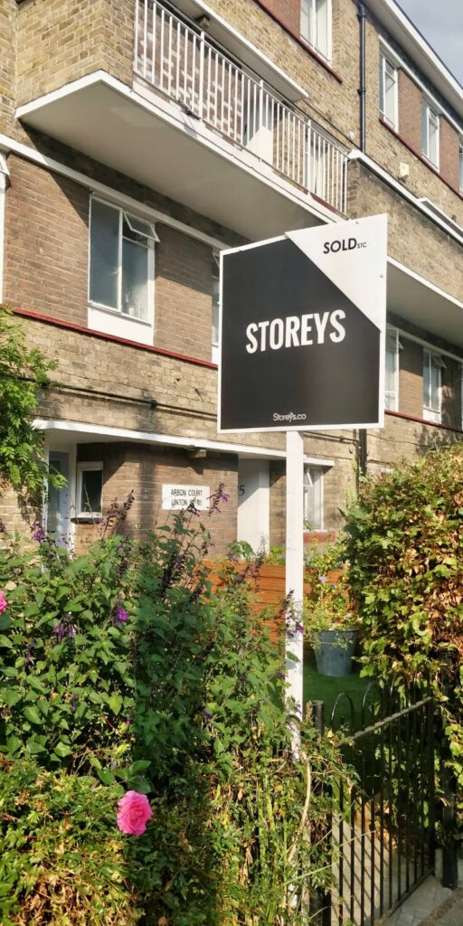Storeys Sold sign outside a property